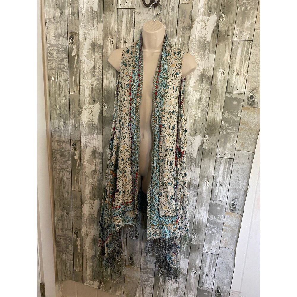 Soft surrounding open front boho fringe sleeveless cardigan